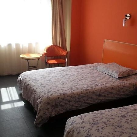 Motel 168 Hotel Urumqi Exterior photo